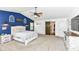 Relaxing main bedroom with vaulted ceiling, accent wall, and a sliding barn door to the closet at 7755 Dayflower Ct, Noblesville, IN 46062