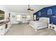 Spacious main bedroom with vaulted ceilings, ceiling fan, and ample natural light at 7755 Dayflower Ct, Noblesville, IN 46062