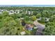 An aerial view showing the backyard with a trampoline, basketball court and a deck with a hot tub at 8140 Bold Forbes Ct, Indianapolis, IN 46217