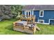 Backyard deck area complete with a hot tub, perfect for relaxation at 8140 Bold Forbes Ct, Indianapolis, IN 46217