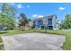 Large backyard with basketball court and manicured lawn at 8140 Bold Forbes Ct, Indianapolis, IN 46217