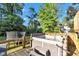 Deck features a hot tub, with a fenced yard and basketball court at 8140 Bold Forbes Ct, Indianapolis, IN 46217