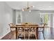 Cozy dining room showcasing a rustic wooden table with seating for six at 8140 Bold Forbes Ct, Indianapolis, IN 46217