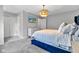 This secondary view of the main bedroom displays an in-wall television and extra closet space at 8140 Bold Forbes Ct, Indianapolis, IN 46217