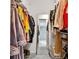 This is a walk-in closet with shelves and bars for hanging clothes and storing personal items at 8140 Bold Forbes Ct, Indianapolis, IN 46217
