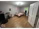 Bedroom with hardwood floors and a window view at 8407 Campbell Ct, Mooresville, IN 46158