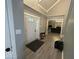 Spacious entryway boasts hardwood floors, natural light, and neutral paint at 8407 Campbell Ct, Mooresville, IN 46158