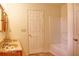 Bright bathroom features a double sink vanity, tile floor, and shower-tub combo at 8905 Maze Rd, Indianapolis, IN 46259