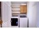 Laundry room with shelving and side-by-side washer and dryer at 8905 Maze Rd, Indianapolis, IN 46259