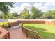 View of backyard from deck, showing lawn and privacy fence at 8925 Sunburst Cir, Indianapolis, IN 46227
