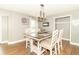 Bright dining room features a stylish table, charming decor, and inviting atmosphere at 8925 Sunburst Cir, Indianapolis, IN 46227
