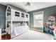 Fun bedroom with unique bunk bed and window, offering a playful and inviting space at 9237 Rocky Cay Ct, Zionsville, IN 46077