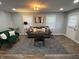 Inviting living room showcasing stylish decor, plush seating, and a neutral color palette at 937 N Routiers Ave, Indianapolis, IN 46219
