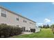 Exterior home with patio, lawn, privacy fence, and trees in the distance at 9707 Prairie Smoke Dr, Noblesville, IN 46060