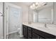 Bathroom features double sink, vanity, large mirror, and private toilet at 9707 Prairie Smoke Dr, Noblesville, IN 46060