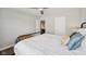 Bedroom features decorative pillows, ceiling fan, and neutral decor at 9707 Prairie Smoke Dr, Noblesville, IN 46060