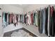 Walk-in closet with organized shelving for ample storage and a plush rug at 9707 Prairie Smoke Dr, Noblesville, IN 46060