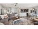 Spacious living area with an open layout, seamlessly connecting the living room, dining area, and kitchen at 9707 Prairie Smoke Dr, Noblesville, IN 46060