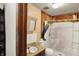 A bathroom with a toilet, sink, shower and mirror at 10159 Hodge Rd, Clayton, IN 46118