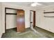 A bedroom with a closet, ceiling fan, and doorway leading to another room at 10159 Hodge Rd, Clayton, IN 46118