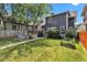 Charming backyard featuring a stone patio with a conversation set and a lush lawn at 1105 Windsor St, Indianapolis, IN 46201