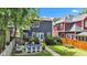 Charming backyard featuring a stone patio with a conversation set and a lush lawn at 1105 Windsor St, Indianapolis, IN 46201