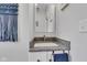 Bright bathroom featuring a granite countertop vanity and a minimalist mirror at 1105 Windsor St, Indianapolis, IN 46201