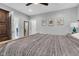 Bright bedroom with carpet flooring, wood furniture, and ample natural light at 1105 Windsor St, Indianapolis, IN 46201