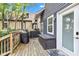 Cozy wooden deck with outdoor furniture, perfect for grilling and relaxation at 1105 Windsor St, Indianapolis, IN 46201