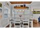 Charming dining room features decorative wood ceiling, pendant lighting, and a spacious table at 1105 Windsor St, Indianapolis, IN 46201