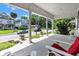 Covered front porch featuring columns, hanging plants, and comfortable seating at 1105 Windsor St, Indianapolis, IN 46201