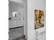 Hallway view showcasing a white dresser and a round mirror at 1105 Windsor St, Indianapolis, IN 46201