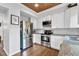 Well-equipped kitchen with stainless steel appliances and sleek countertops at 1105 Windsor St, Indianapolis, IN 46201