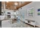 This lovely kitchen has stainless steel appliances and a dining area with access to the back yard at 1105 Windsor St, Indianapolis, IN 46201