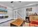 Stylish living room featuring a mounted TV, french doors, and wood floors at 1105 Windsor St, Indianapolis, IN 46201