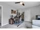 Well-lit home office area, complete with desk, chair, and storage at 1105 Windsor St, Indianapolis, IN 46201