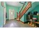 Classic entryway featuring hardwood floors, staircase, and neutral wall paint, blending traditional elements with comfort at 1129 Trowbridge St, Indianapolis, IN 46203