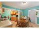 Efficient kitchen featuring tile floors, wooden cabinets, and stainless steel sink at 1129 Trowbridge St, Indianapolis, IN 46203