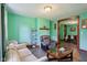 Inviting living room with comfortable seating, hardwood floors, and stylish decor at 1129 Trowbridge St, Indianapolis, IN 46203