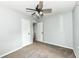 Spacious carpeted bedroom with easy access to the hallway and additional rooms at 114 South St, Southport, IN 46227