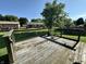 Back deck featuring wood flooring and metal wire fence, an inviting outdoor space at 1202 Tomahawk Pl, Martinsville, IN 46151