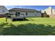 Spacious backyard with a wooden deck, perfect for outdoor entertaining and relaxation at 1202 Tomahawk Pl, Martinsville, IN 46151