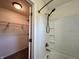 Bathroom featuring a shower and walk in closet with wire shelving at 1202 Tomahawk Pl, Martinsville, IN 46151