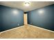 Bedroom with plush carpet and neutral trim, creating a comfortable and inviting space at 1202 Tomahawk Pl, Martinsville, IN 46151