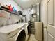 Functional laundry room with modern washer, dryer, and plenty of storage space at 1202 Tomahawk Pl, Martinsville, IN 46151