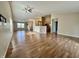 Bright and spacious living room features an open floor plan and laminate flooring at 1202 Tomahawk Pl, Martinsville, IN 46151