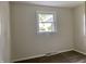 Bedroom featuring a window with a view of the outdoors at 1400 Evelyn Ln, Anderson, IN 46017