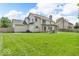 Expansive backyard with a pergola-covered patio, perfect for outdoor entertaining at 15075 Windsor Ln, Noblesville, IN 46060