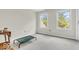 Sunlit bedroom showcasing two windows that flood the room with natural light and a comfortable, neutral space at 15075 Windsor Ln, Noblesville, IN 46060