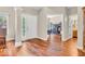 Inviting foyer with hardwood floors, natural light, and views into the living spaces at 15075 Windsor Ln, Noblesville, IN 46060